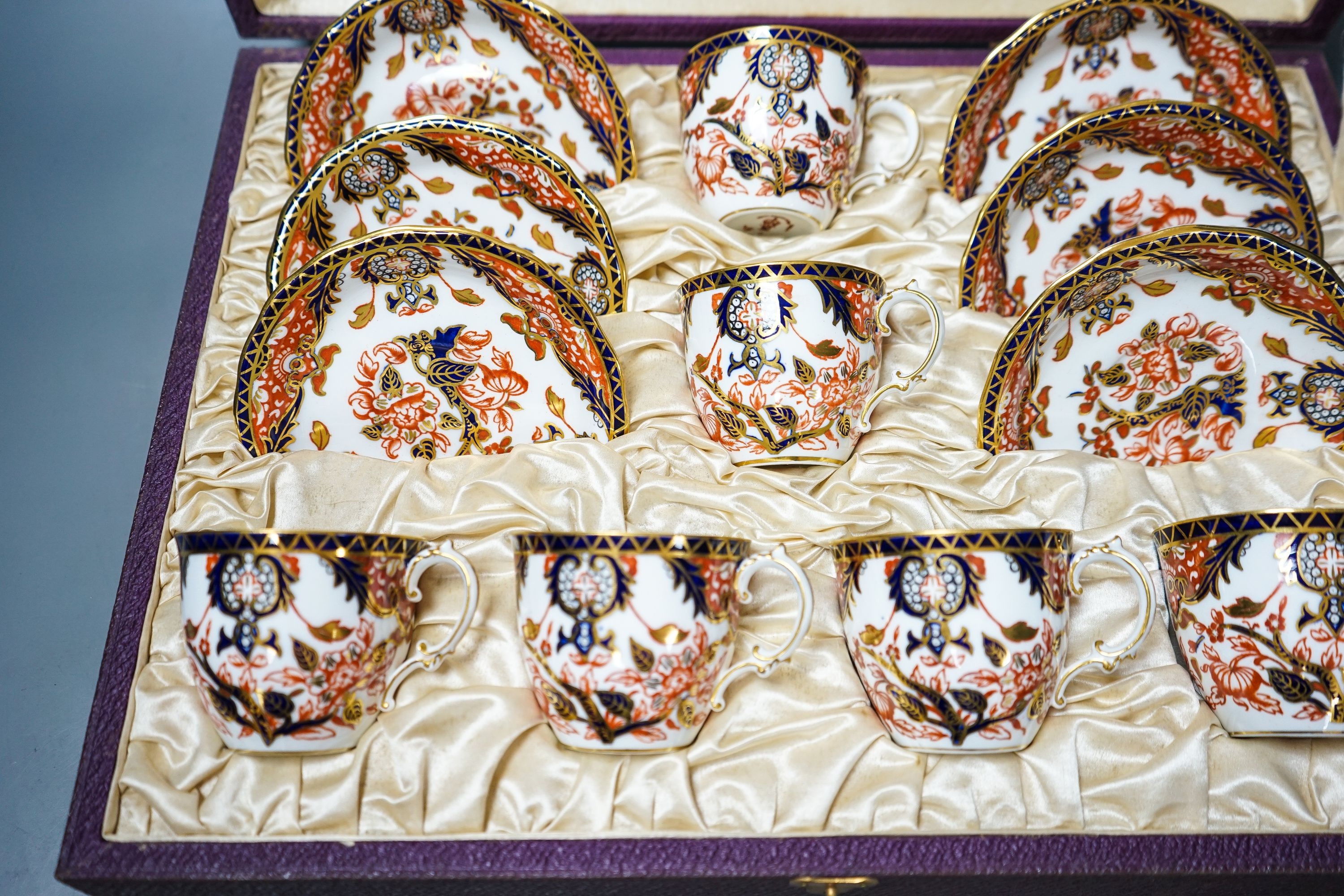 A cased Crown Derby Imari pattern coffee service